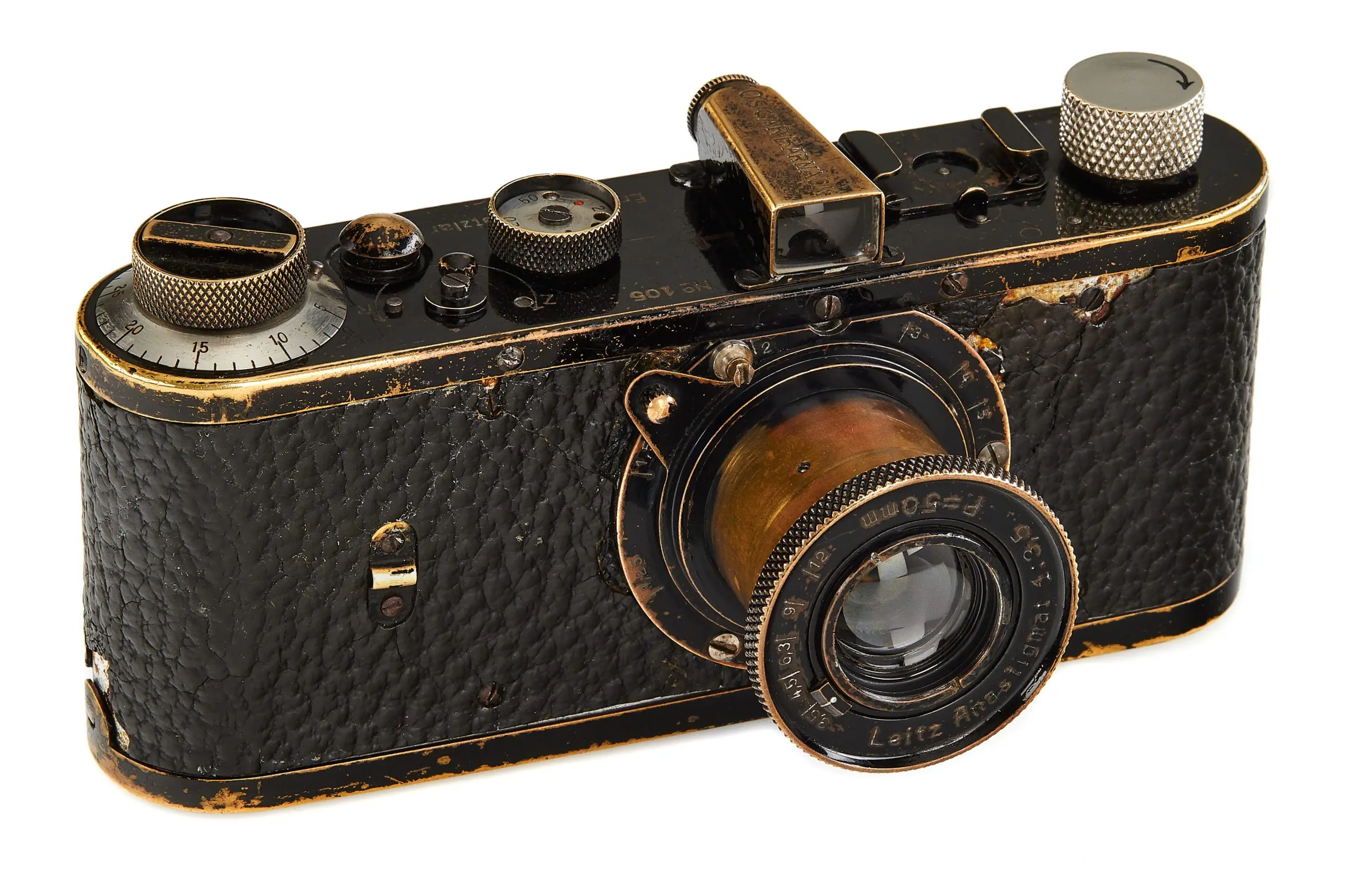 Leica 105 Kamera mit großem Objektiv in seitlicher Detailansicht